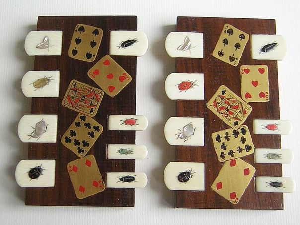 Pair decorated with playing cards – (2903)